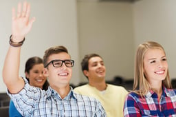 education-high-school-teamwork-people-concept-group-smiling-students-raising-hand-lecture-hall